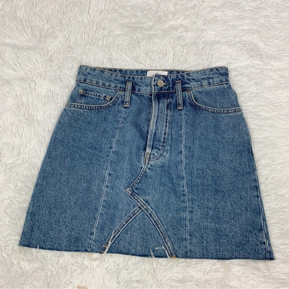 Anine Bing‎ denim mini skirt raw hem button fly in blue